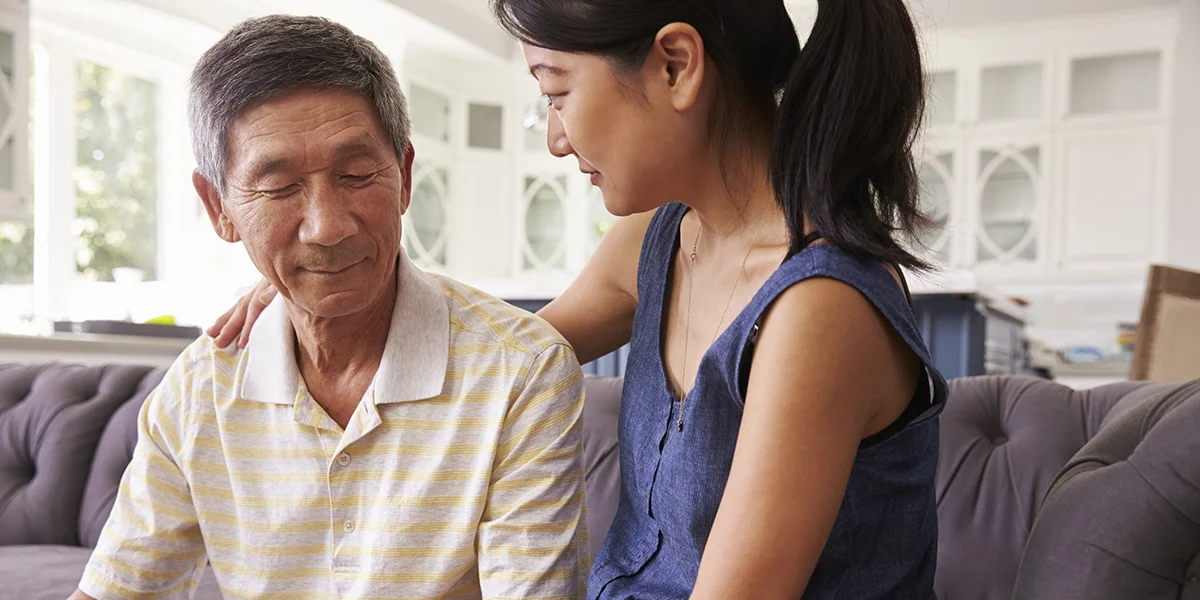 Elderly gentleman and professional caregiver